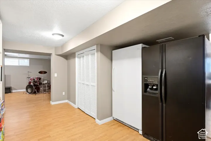 Wood-finish flooring throughout, a louvered bi-fold closet, and a recessed window