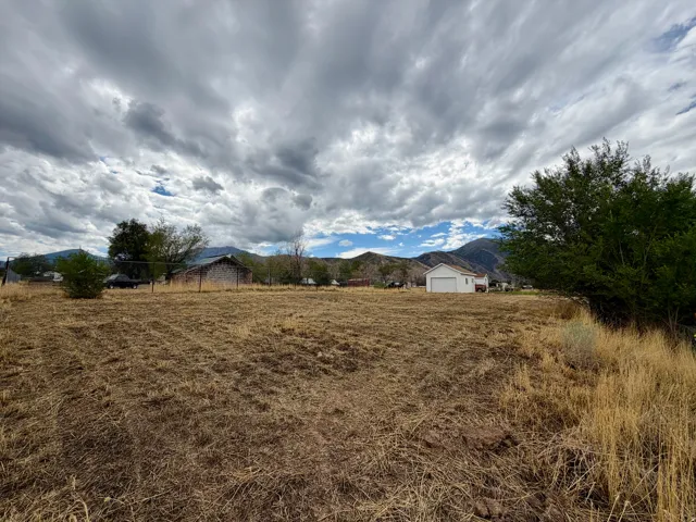 Expansive undeveloped lot with distant mountain backdrop
