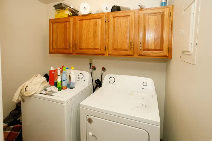 Built-in cabinetry with natural wood-finish doors