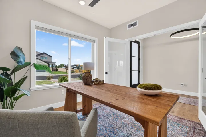 Hardwood flooring and light wall colors create a bright interior