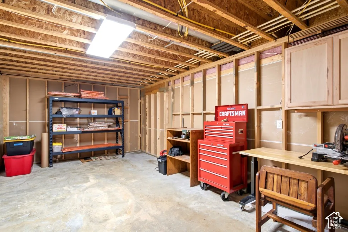 Huge unfinished storage room, perfect for a theatre room, workshop, or home gym space