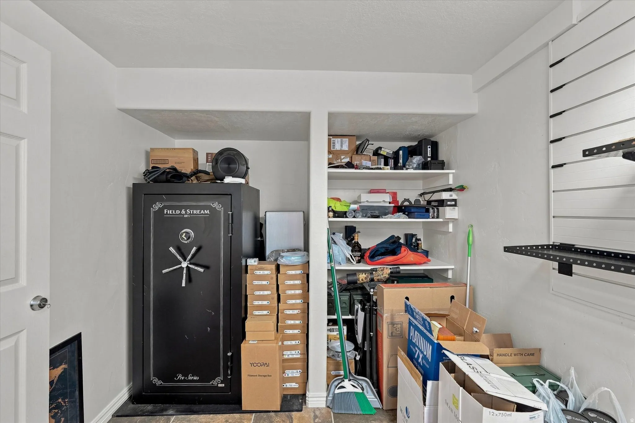 Recessed storage alcoves with built-in shelving, durable hard-surface flooring