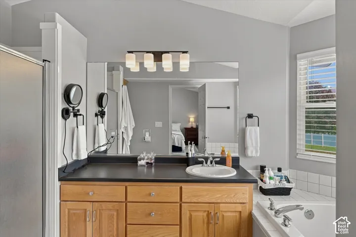 Wood-finish cabinetry with clear knob hardware