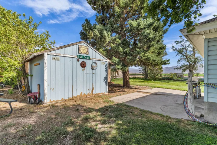 Detached storage shed with a gabled roof
