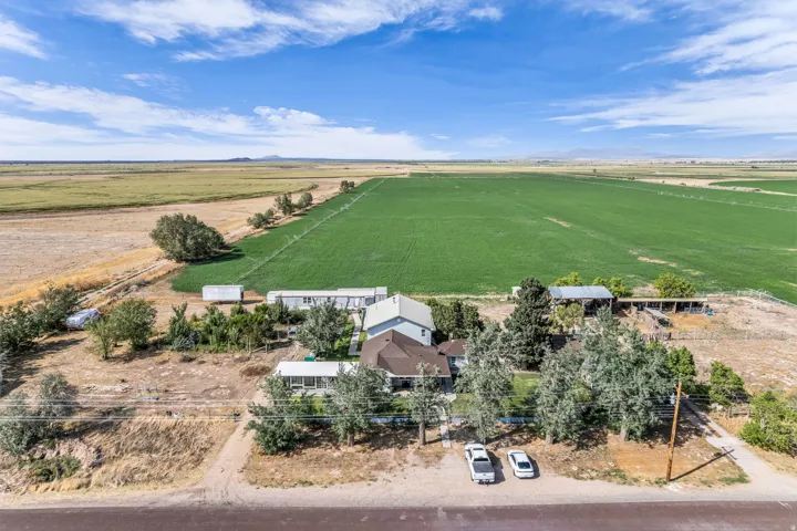 Expansive cultivated fields adjacent to the property