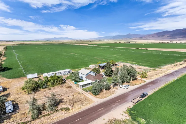 Expansive agricultural fields with distant mountain range