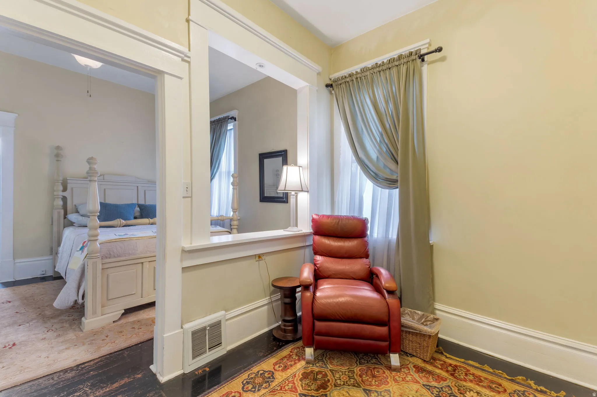 Wood-finish flooring with classic white trim throughout