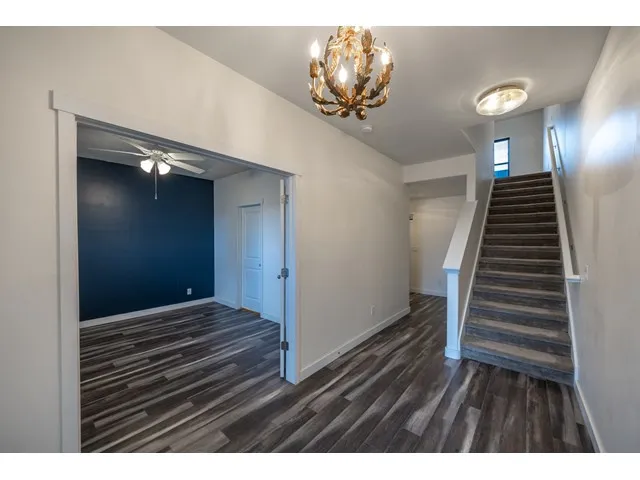 Entry leads to main level ensuite main level bedroom.
