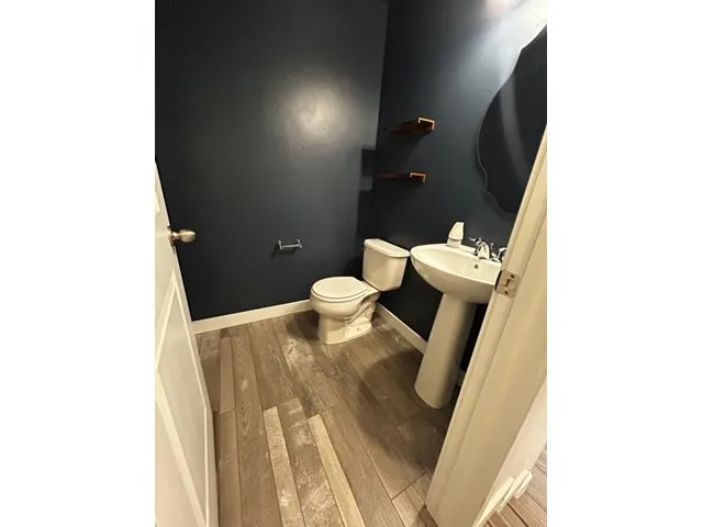 Convenient half-bath just off of the kitchen.