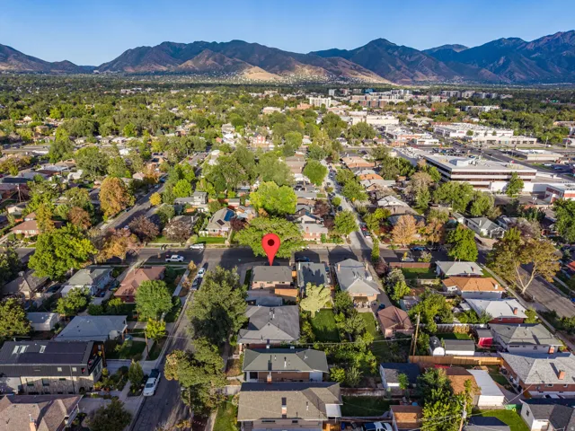 Urban residential setting with a prominent mountain backdrop