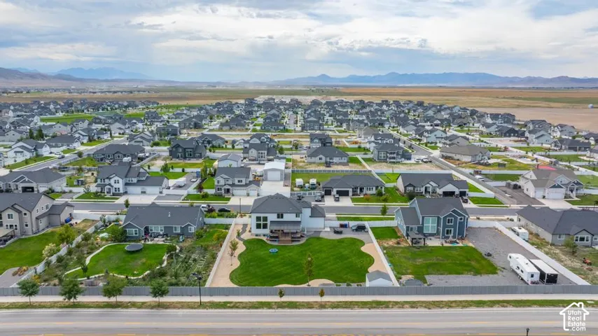 Expansive residential community with established homes, well-maintained streets, and mountain backdrops
