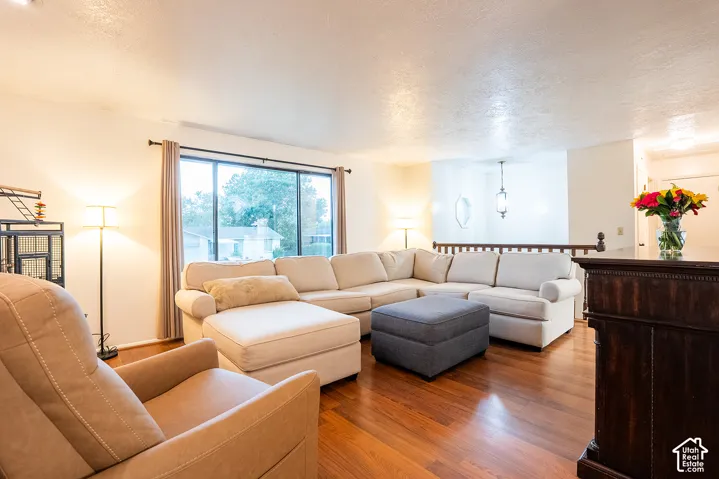 Recessed lighting and wood-finish flooring