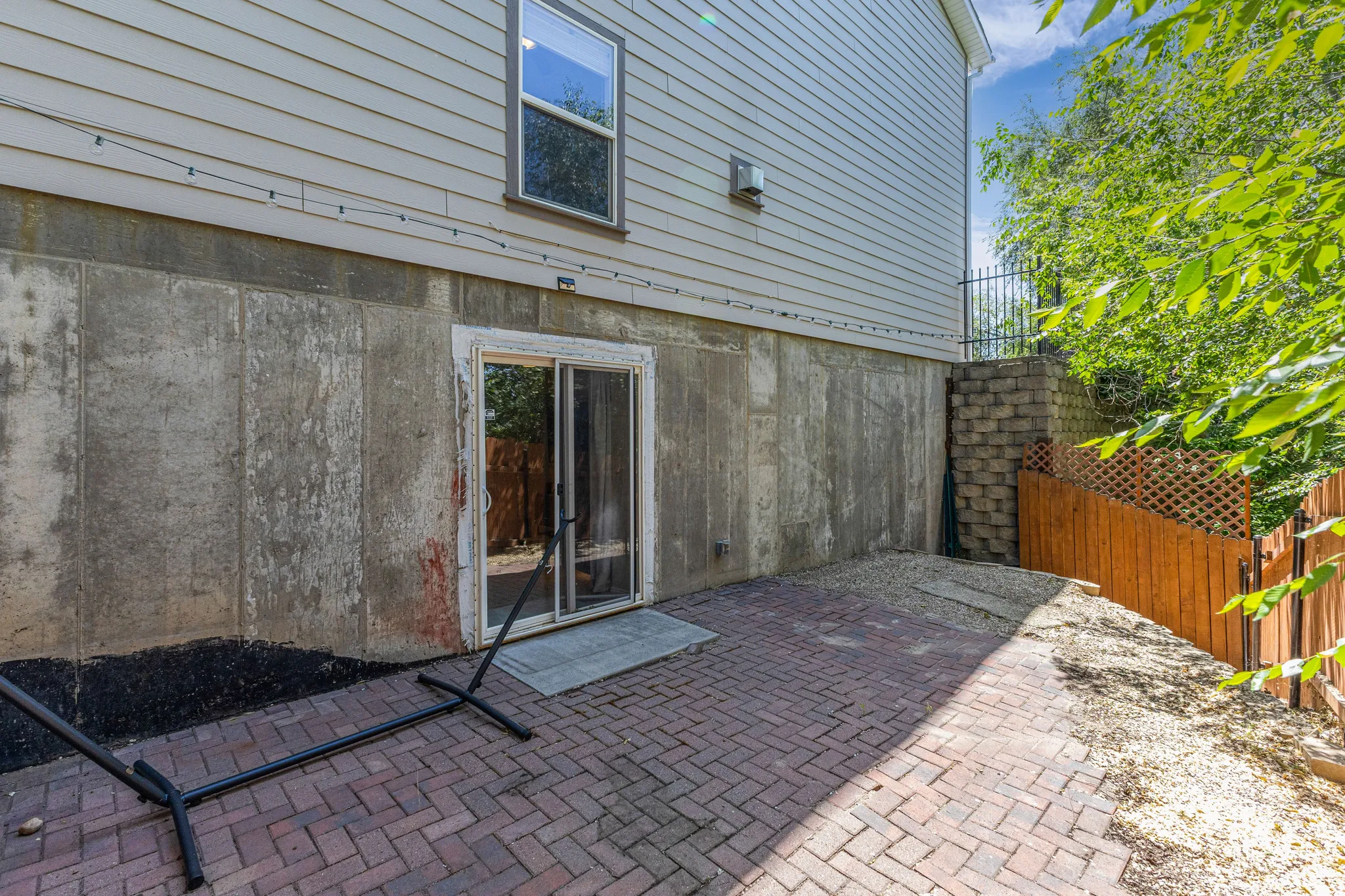 Brick paver patio with sliding glass door access