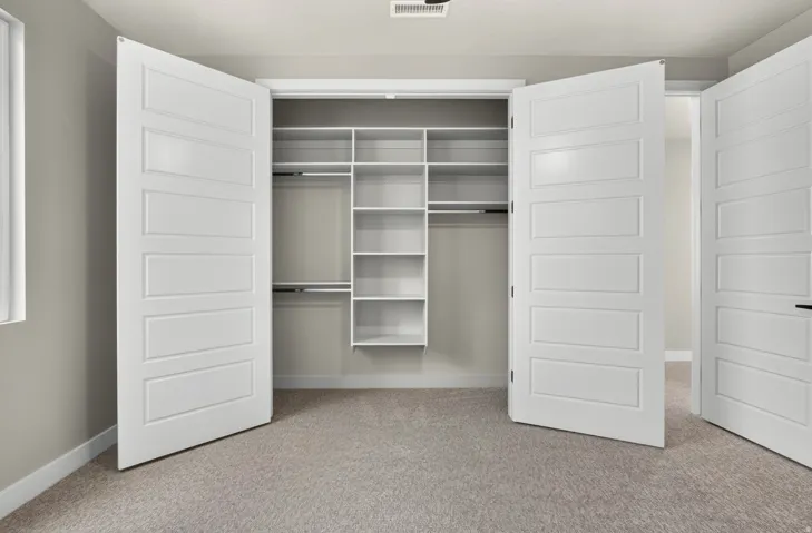 Built-in closet shelving and hanging rods