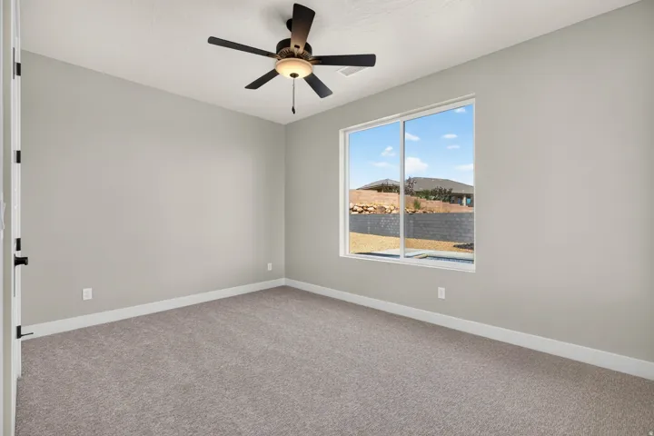 Neutral-toned carpeting and walls