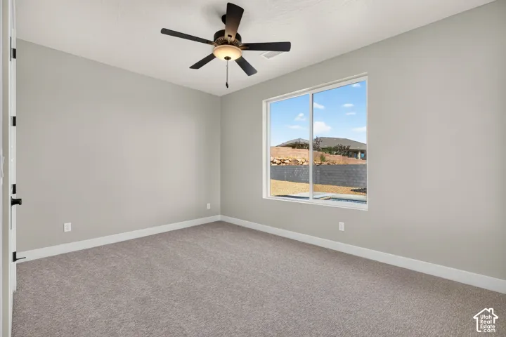 Neutral-toned carpeting and walls