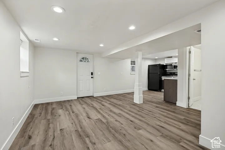 Basement entrance and living room