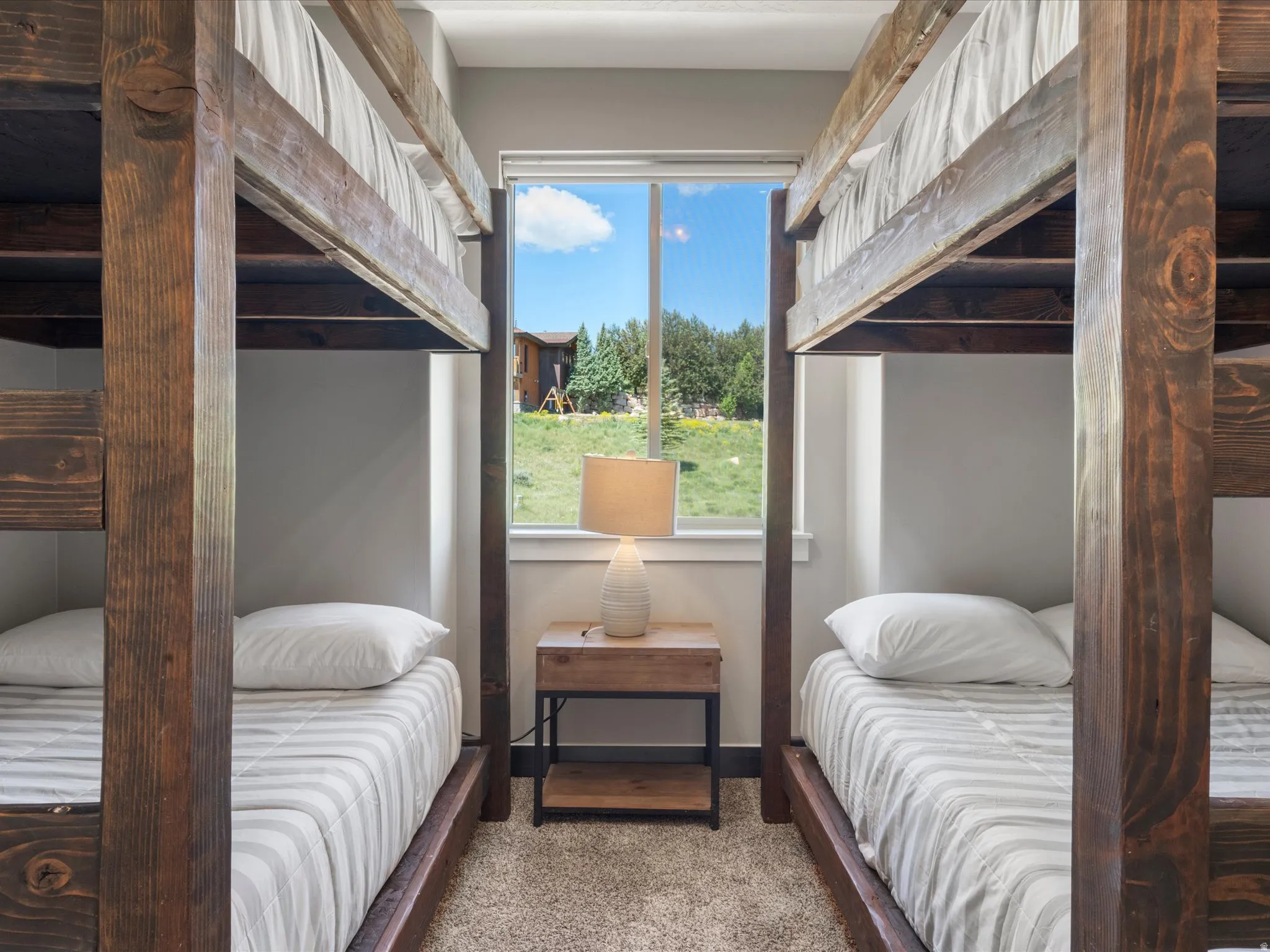 Built-in bunk beds with rich wood-finish frames