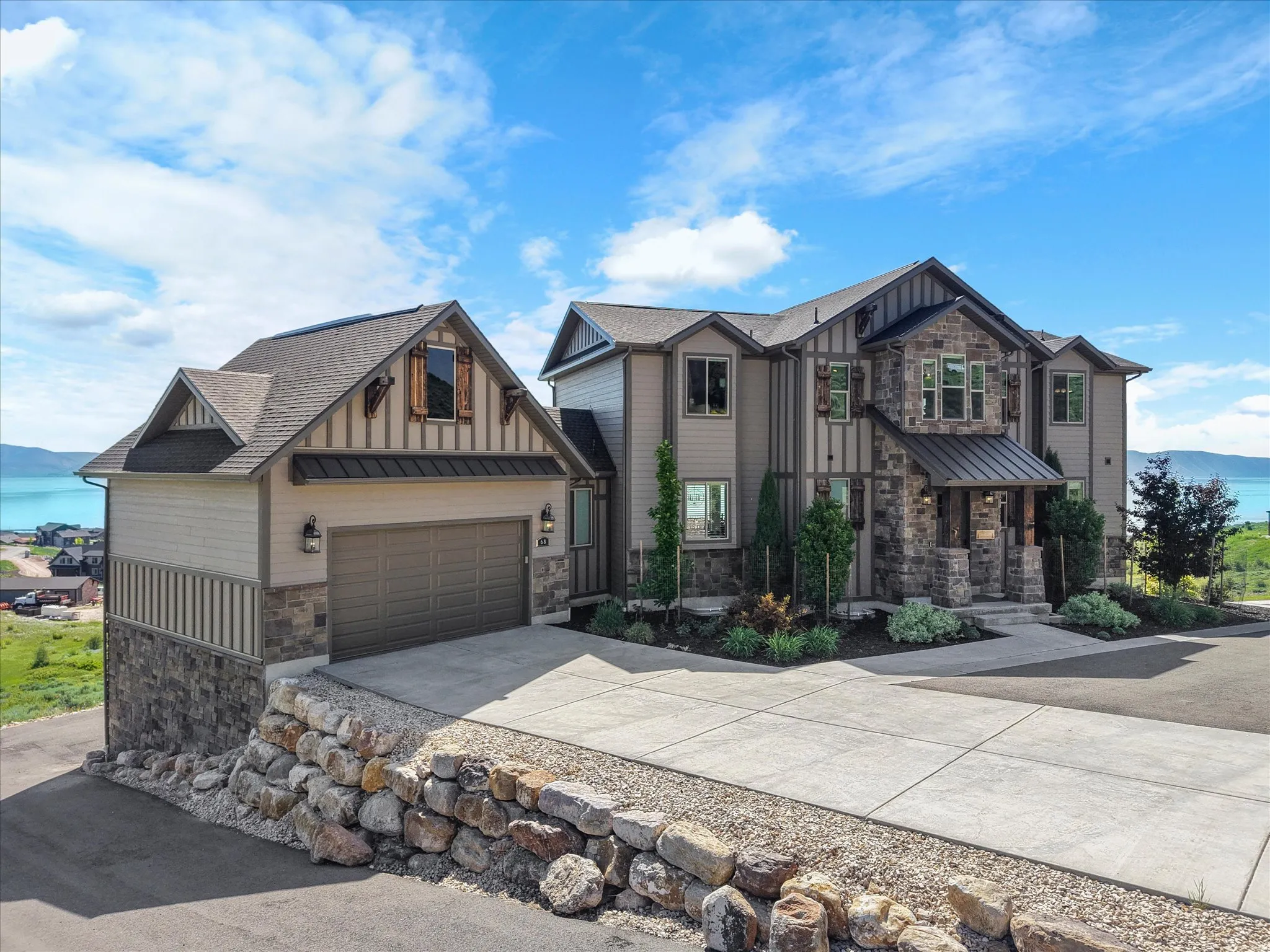 Stone and siding exterior with a multi-gabled roofline