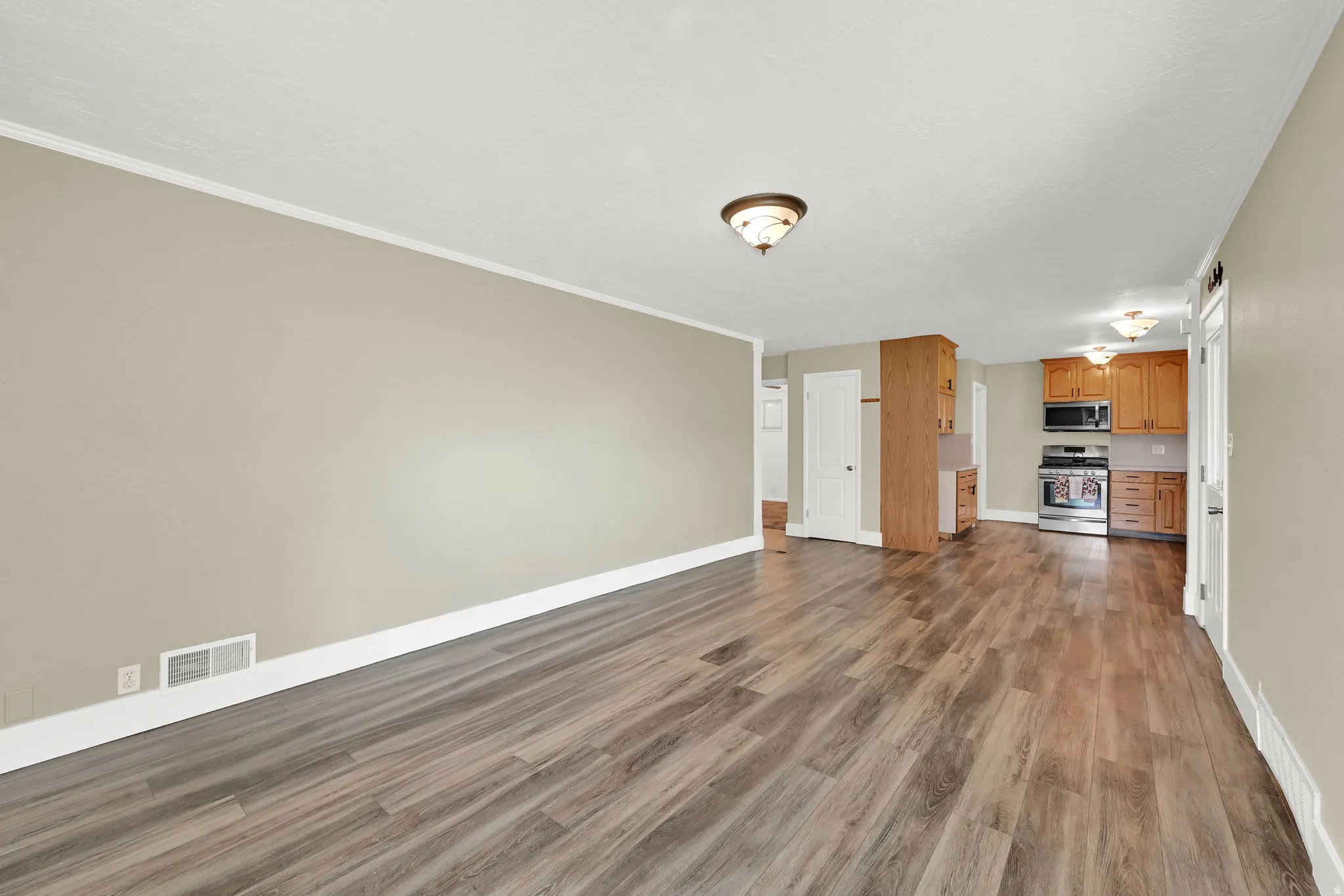 Another view of the great room — a perfect space for relaxing, entertaining, and making memories.