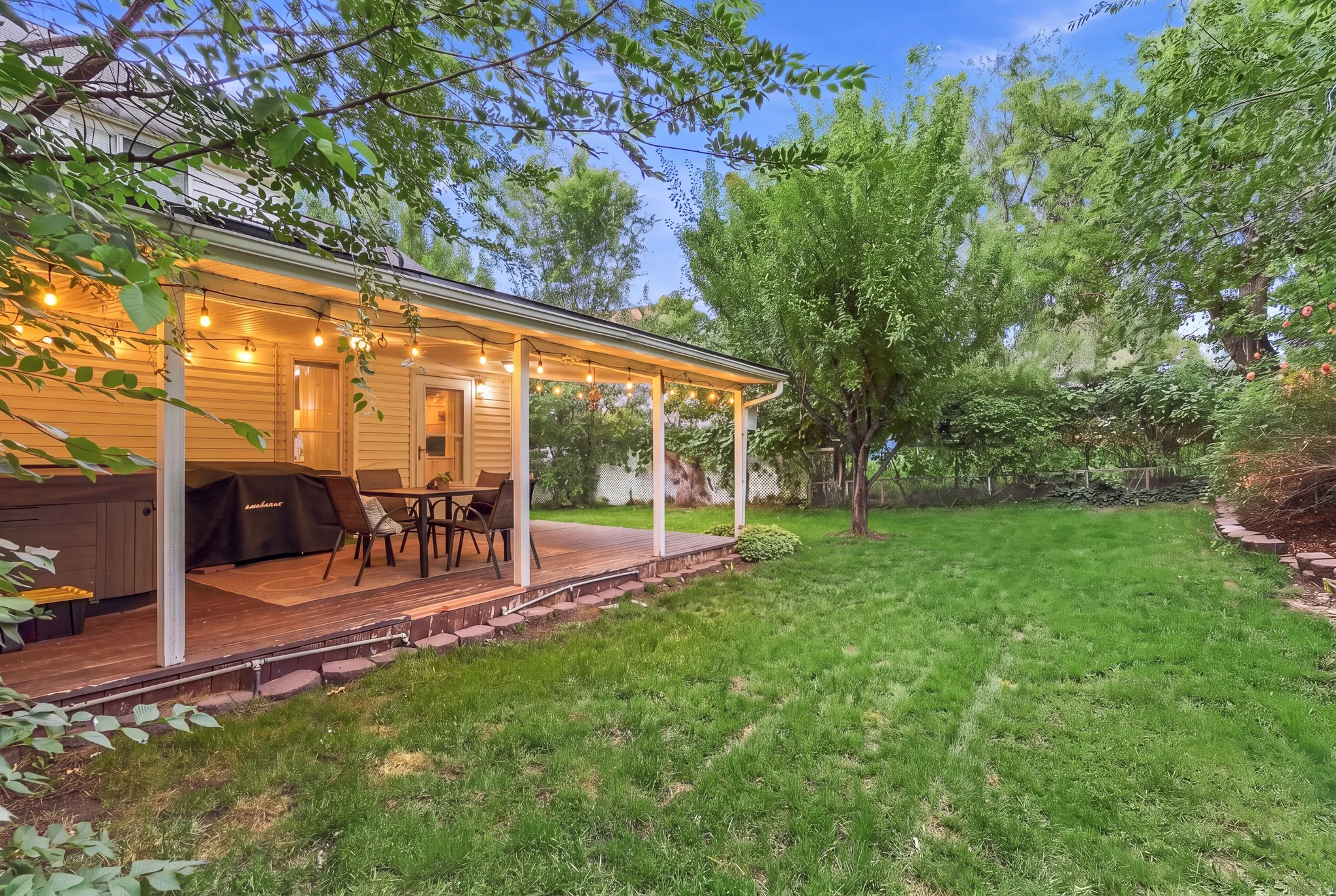 Private setting with a covered deck and Hot Tub