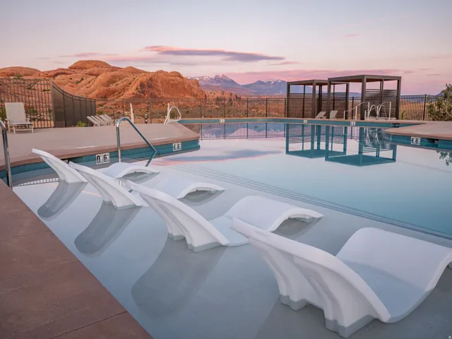 Resort-style pool with integrated in-water lounge seating