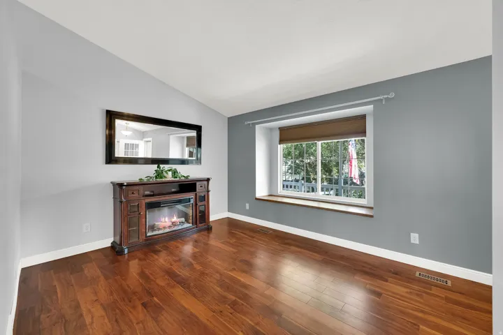 Wood-finish flooring with an electric fireplace