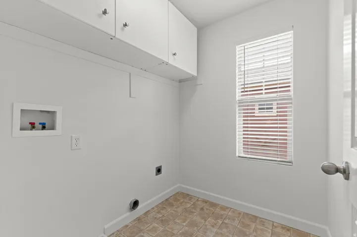 White cabinetry with silver-tone hardware