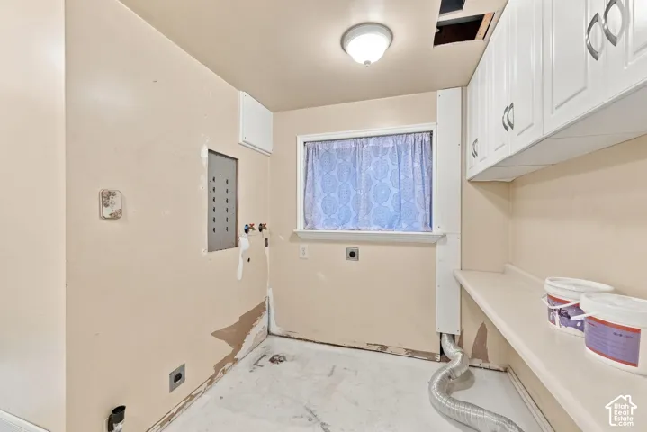 White upper cabinetry with decorative hardware