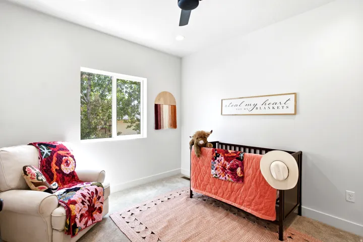 Recessed lighting, ceiling fan, white walls, and carpet flooring