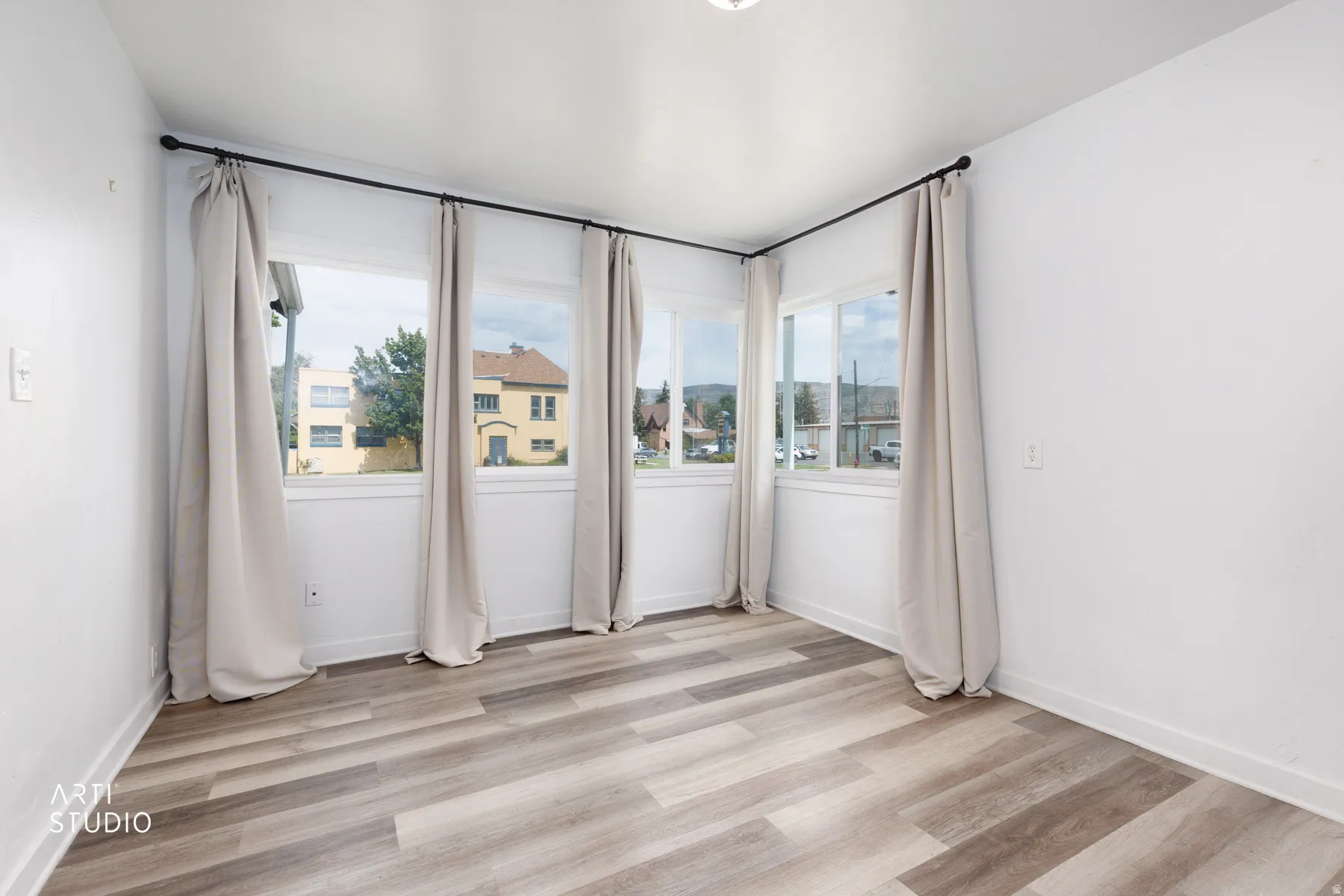 Wood-finish flooring with white walls