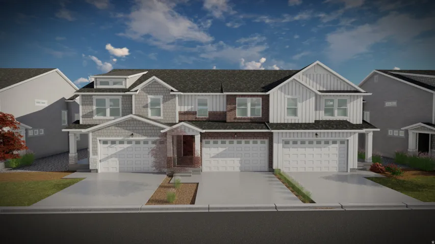 Multi-unit residential structure featuring brick and siding exteriors, attached garages, and a paved driveway