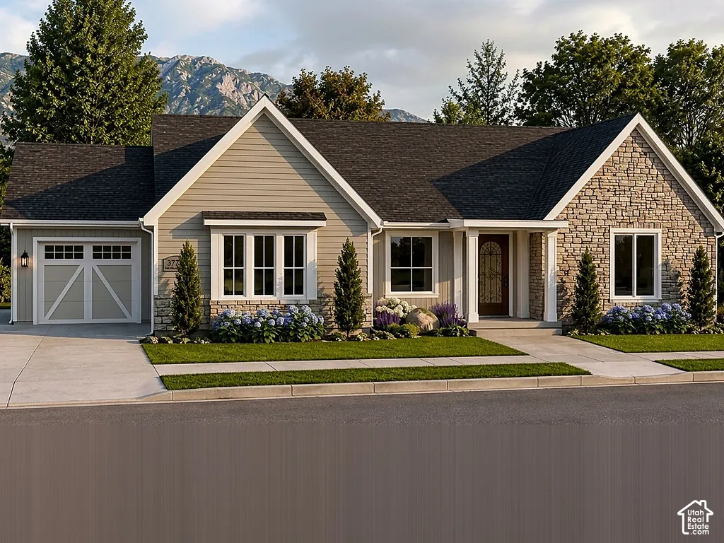 Stone and siding exterior with a dark shingle roof