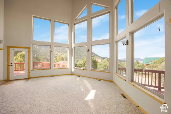 Soaring ceilings with extensive window panels
