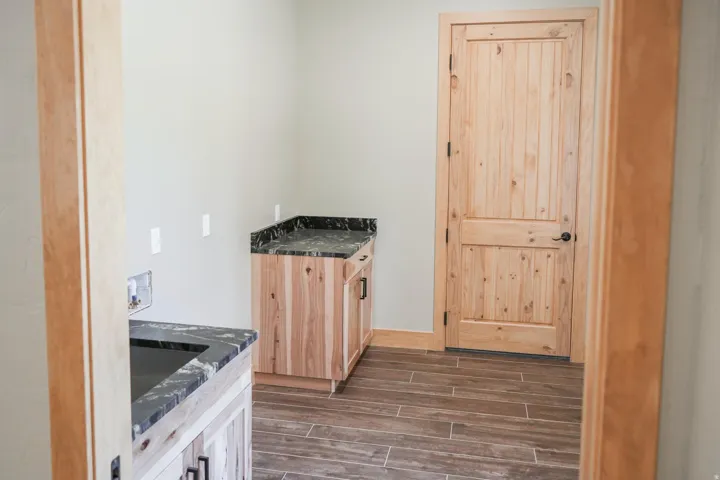Wood-finish flooring with light-toned walls