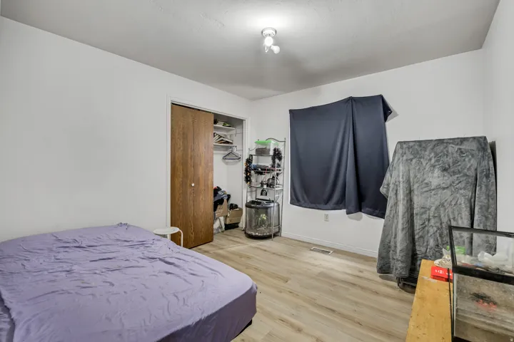 Wood-finish flooring with white walls