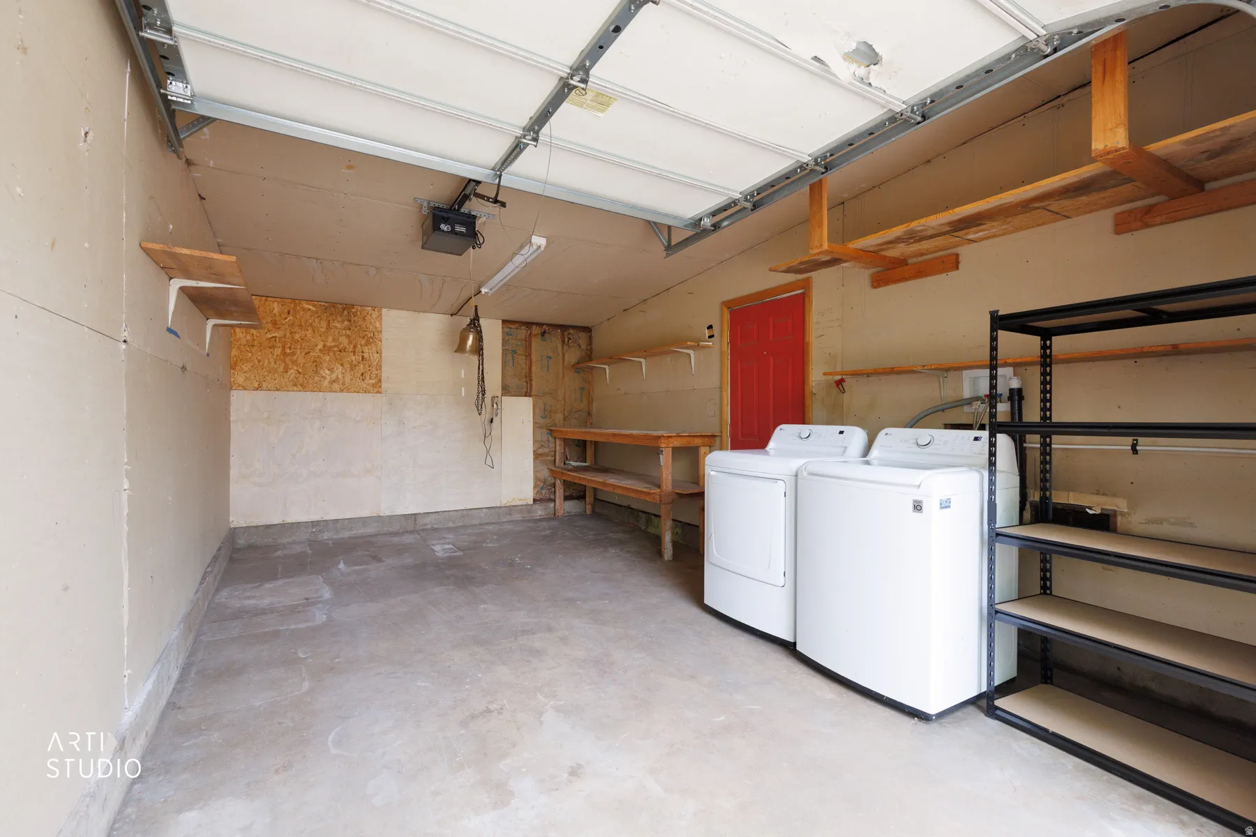 Concrete flooring with overhead garage door