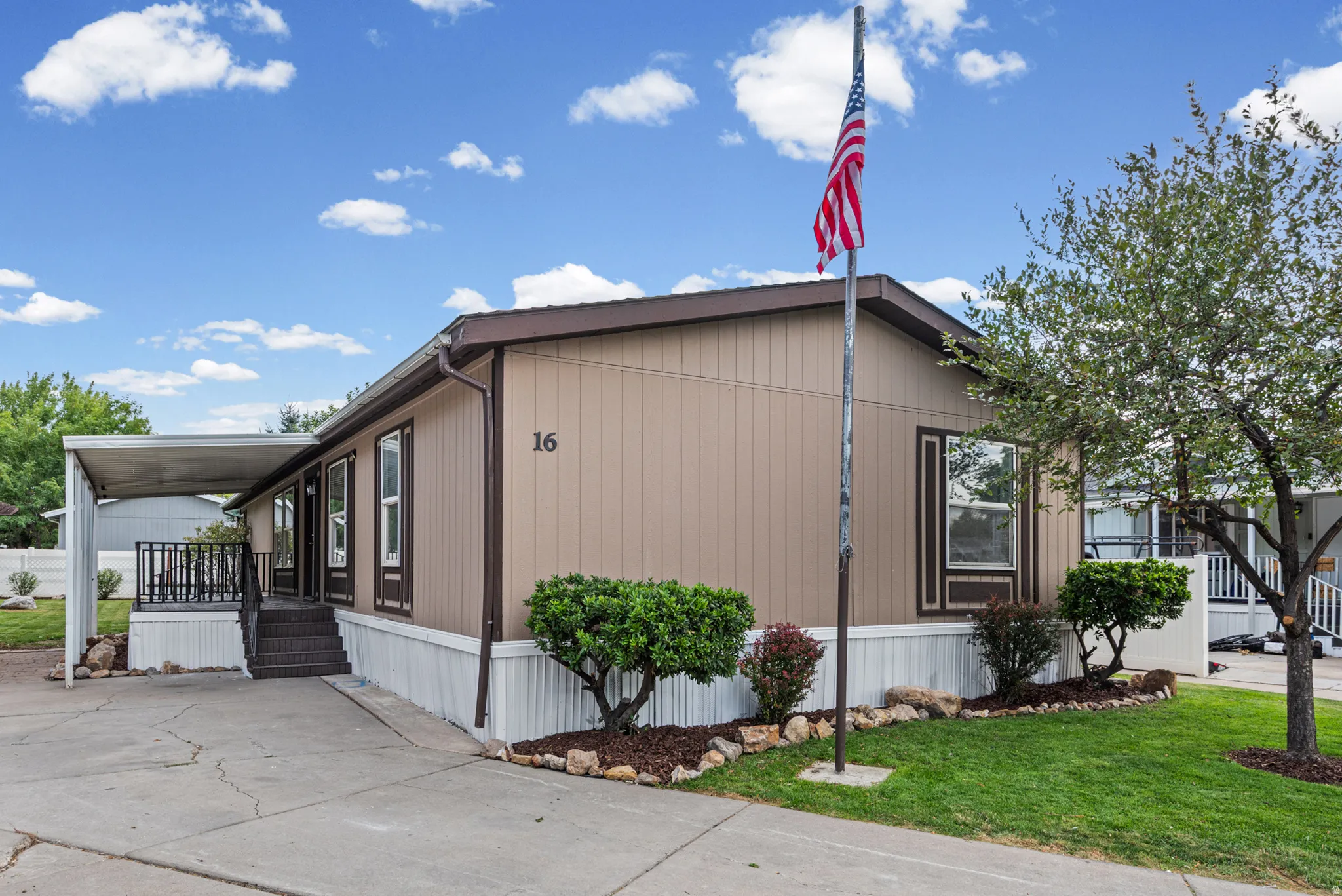 Single-level residence with vertical siding and trim accents