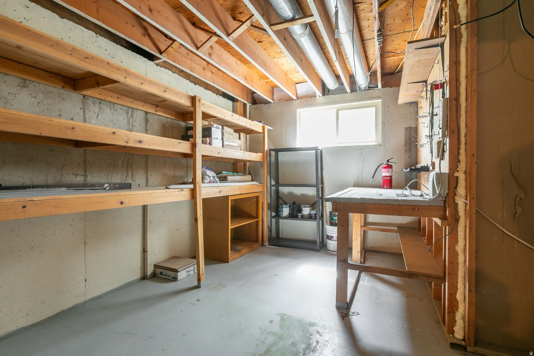 Exposed ceiling joists with visible ductwork