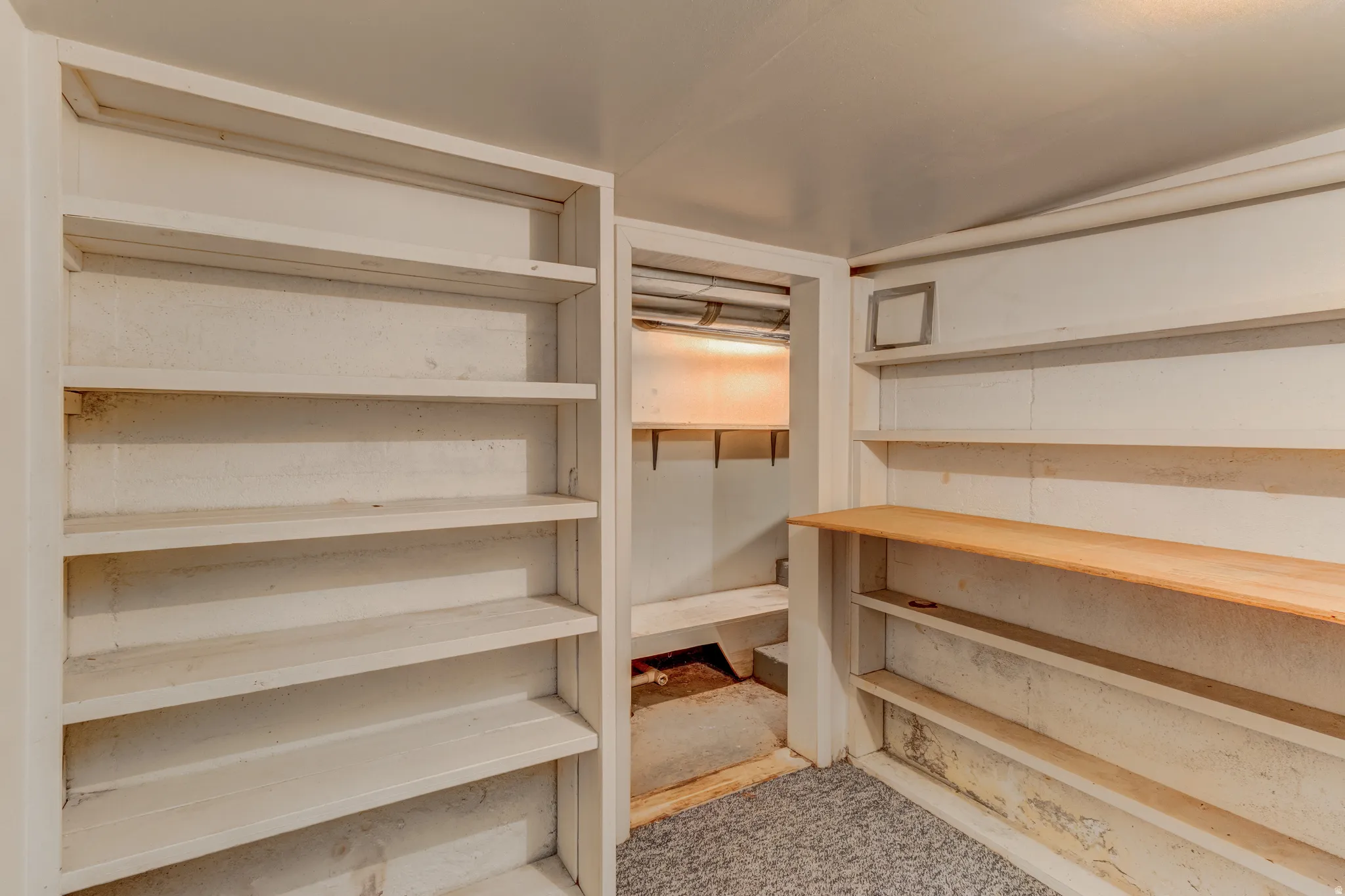 Built-in shelving, wood-finish shelving, and wall-mounted shelving