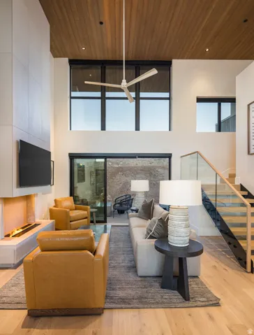 Open-concept living space featuring a wood-finish vaulted ceiling with an integrated ceiling fan and recessed lighting