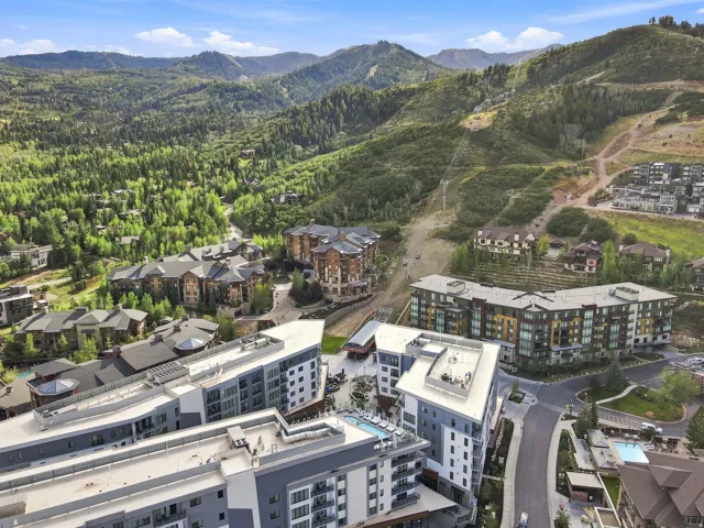 Aerial of the Canyons Village resort base at Park City Mountain with Pendry Park City in the foreground.