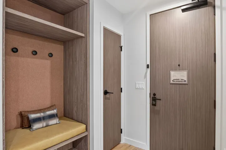 Gear entry with bench seating and closet storage for ski boots, skis and helmets, a Park City must-have.