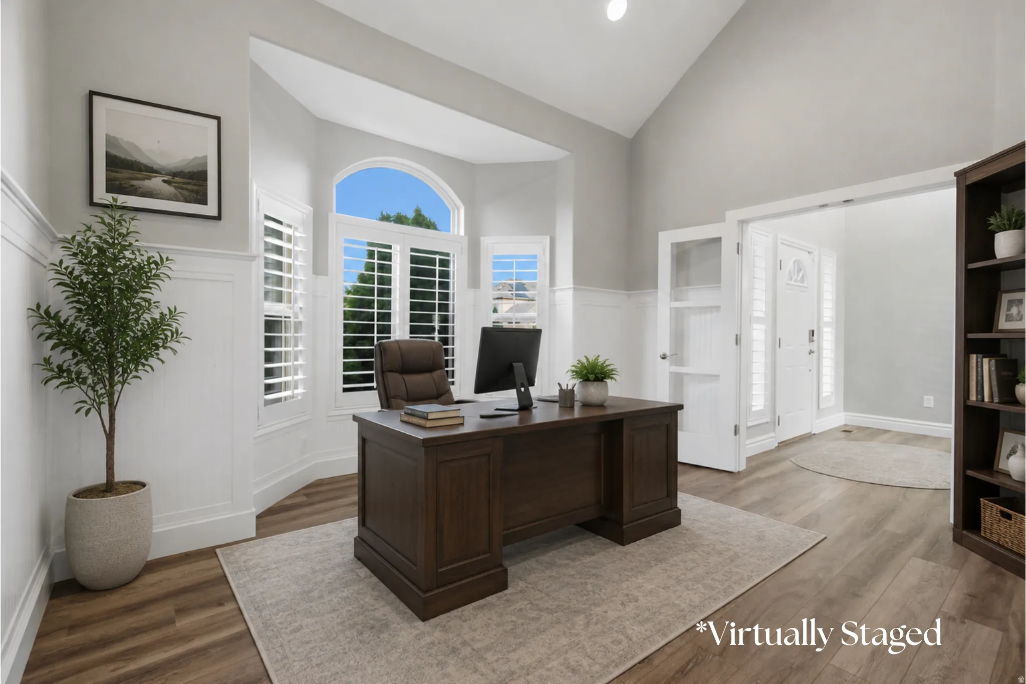 Vaulted ceiling, wainscoting, bay window with plantation shutters, wood-finish flooring, and glass-paneled double doors