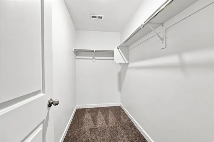 White painted interior door with brushed nickel hardware