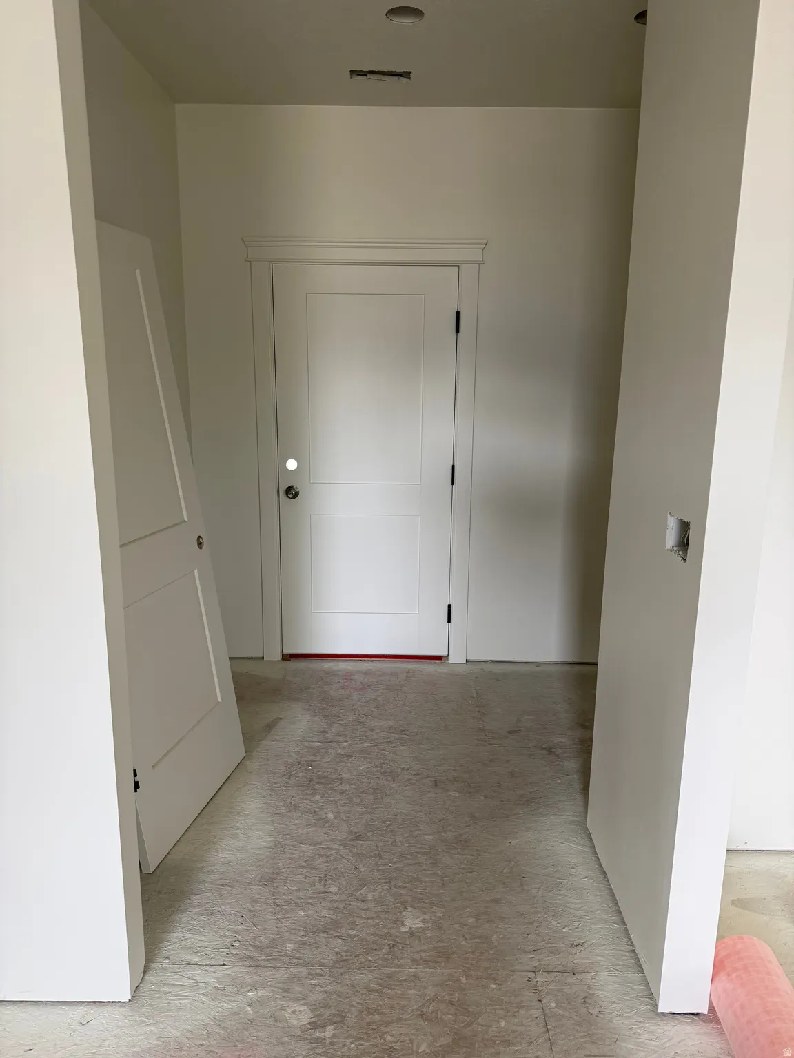 White two-panel door with decorative trim