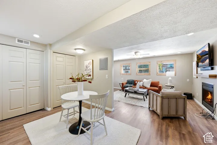 Basement kitchenette and dining space with a view into the downstairs living room.