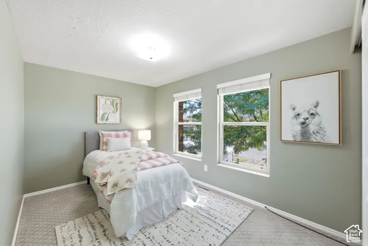 Second upstairs bedroom with ample natural light