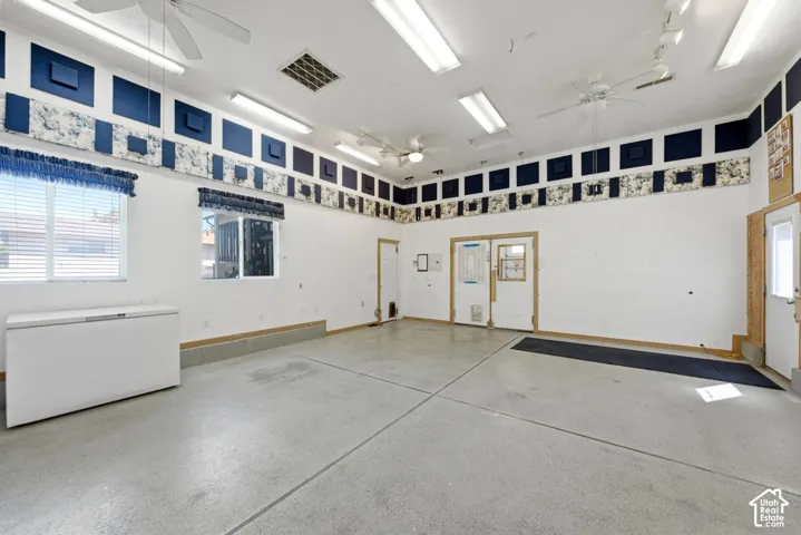 Fully permitted 500+ sq ft flex space.  Attached to the garage with double doors, to the house basement by a single door, and to the side parking area by a single door.