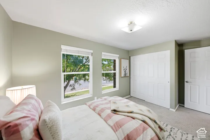 Second upstairs bedroom with ample natural light
